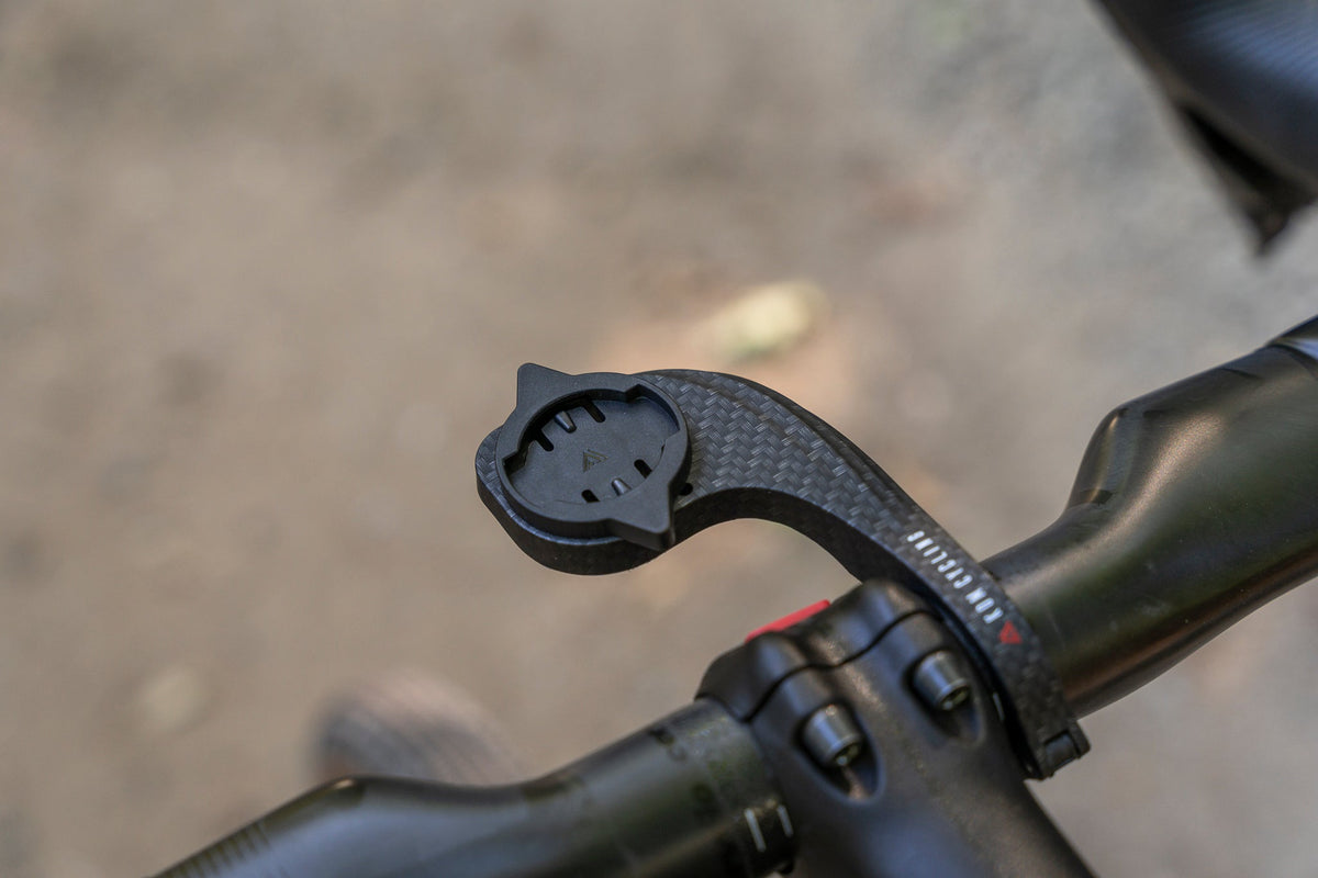 Seamlessly Mount Your Wahoo Computer on Garmin Mounts: A Quick Guide with KOM Cycling's Adapter